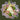 Floral arrangement with white, pink, and green flowers in a decorative paper holder.